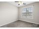 Neutral bedroom features gray carpet and a window for natural light at 1305 Dan Dr, Rock Hill, SC 29732