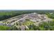 Overhead shot of neighborhood showcasing lush landscaping, well-maintained homes, and community amenities at 13327 Savaine St, Charlotte, NC 28278
