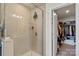 Glass shower and open walk-in closet at 13327 Savaine St, Charlotte, NC 28278