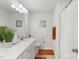 Neutral bathroom featuring vanity with white countertop and decorative accents plus coordinated textiles at 13327 Savaine St, Charlotte, NC 28278