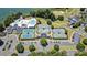 Aerial view showcasing a pool, tennis courts, and other recreational amenities in the community at 167 Quaker Rd, Mooresville, NC 28117