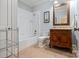 Bathroom features a shower and bathtub combo, a vanity with a granite countertop, and tile floors at 167 Quaker Rd, Mooresville, NC 28117