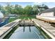 View of a private boat lift, slips and covered boat storage with access to beautiful lake at 167 Quaker Rd, Mooresville, NC 28117