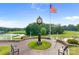 Gorgeous clubhouse view with an ornate clock and American flag at 167 Quaker Rd, Mooresville, NC 28117