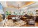 Spacious living room featuring leather furniture, hardwood flooring and arched doorways at 167 Quaker Rd, Mooresville, NC 28117