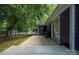 A cozy back patio featuring an adjacent sliding glass door, and a partially shaded concrete surface at 172 Valleybrook Dr # 8, Denver, NC 28037