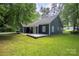 Expansive backyard with a spacious deck and lush lawn providing ample space for recreation at 172 Valleybrook Dr # 8, Denver, NC 28037