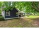 Inviting backyard with a deck, lush lawn, ideal for outdoor gatherings and relaxation at 172 Valleybrook Dr # 8, Denver, NC 28037