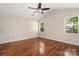 Bedroom with hardwood floors, vaulted ceiling, ceiling fan, and two windows at 172 Valleybrook Dr # 8, Denver, NC 28037