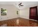 Bedroom features hardwood floors, ceiling fan, vaulted ceiling and natural light at 172 Valleybrook Dr # 8, Denver, NC 28037