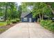 Home showcasing a long driveway, mature landscaping, and a well-maintained exterior at 172 Valleybrook Dr # 8, Denver, NC 28037