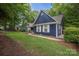 Beautiful home exterior with blue siding, white trim, and a well-maintained lawn at 172 Valleybrook Dr # 8, Denver, NC 28037
