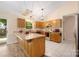 Charming kitchen features wood cabinets, tile backsplash, and stainless-steel appliances at 172 Valleybrook Dr # 8, Denver, NC 28037