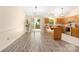 Bright kitchen featuring wood cabinetry, stainless steel appliances, and wood floors at 172 Valleybrook Dr # 8, Denver, NC 28037