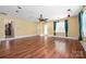 Inviting living room with wood floors, natural light and access to an outdoor kitchen at 172 Valleybrook Dr # 8, Denver, NC 28037
