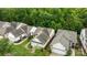 Aerial view of suburban homes with well-maintained lawns and mature trees at 19157 Mallard Dr, Fort Mill, SC 29707