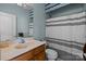Classic bathroom with a vanity, mirror, and shower with a striped curtain at 19157 Mallard Dr, Fort Mill, SC 29707