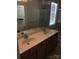 Bathroom with a double sink vanity, framed mirror, and shower behind framed glass doors at 19157 Mallard Dr, Fort Mill, SC 29707