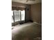 Spacious bedroom with a ceiling fan and natural light from the large window with blinds at 19157 Mallard Dr, Fort Mill, SC 29707