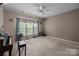 Bedroom featuring carpeted floors and large windows at 19157 Mallard Dr, Fort Mill, SC 29707