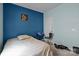 Cozy bedroom featuring a bed and desk setup with contrasting colored walls at 19157 Mallard Dr, Fort Mill, SC 29707