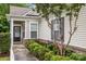Charming single-story home with a well-manicured front garden, walkway, and inviting entrance at 19157 Mallard Dr, Fort Mill, SC 29707
