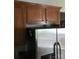 Kitchen featuring stainless steel refrigerator and wood cabinets at 19157 Mallard Dr, Fort Mill, SC 29707