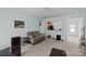 Cozy living room featuring a comfortable couch and an open view into the kitchen at 19157 Mallard Dr, Fort Mill, SC 29707