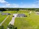 Wide aerial view of the property showcasing the large yard, outbuildings and beautiful countryside at 2268 Westbrook Rd, Edgemoor, SC 29712