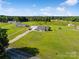 Large aerial view of a lovely home with large yard, outbuildings, and beautiful greenery at 2268 Westbrook Rd, Edgemoor, SC 29712