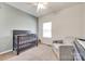 Bright Bedroom with crib, comfortable armchair, and plenty of natural light at 2268 Westbrook Rd, Edgemoor, SC 29712