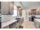 Kitchen featuring stainless steel appliances, marble countertops, modern cabinets, and pantry at 2268 Westbrook Rd, Edgemoor, SC 29712