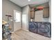 Clean laundry room with modern washer and dryer, neutral floors, and storage cabinets at 2268 Westbrook Rd, Edgemoor, SC 29712