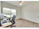 Well-lit home office space with a large window and desk area, ideal for remote work at 2268 Westbrook Rd, Edgemoor, SC 29712