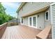 Spacious wooden deck accessible via double doors, perfect for outdoor entertaining at 2728 Touchstone Cir, Newton, NC 28658