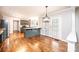 Spacious kitchen adjacent to a breakfast bar and dining area with natural light at 2728 Touchstone Cir, Newton, NC 28658