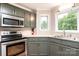 Updated kitchen with stainless steel appliances, and great natural light at 2728 Touchstone Cir, Newton, NC 28658