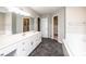 Elegant bathroom with double vanity, tile floors, walk-in closet, and separate tub at 2728 Touchstone Cir, Newton, NC 28658