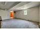 Spacious basement area with painted concrete floor ready for customization at 286 Southside Rd, Rock Hill, SC 29730