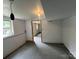 An unfinished basement with painted walls, a window and concrete floor awaits your touches at 286 Southside Rd, Rock Hill, SC 29730