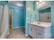 Bathroom featuring a single sink vanity with a large mirror and blue walls at 286 Southside Rd, Rock Hill, SC 29730