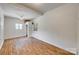 Bright bedroom featuring hardwood floors, ceiling fan, and access to an exterior entrance at 286 Southside Rd, Rock Hill, SC 29730