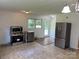 Spacious kitchen with stainless steel appliances and plenty of natural light from window above sink and back door at 286 Southside Rd, Rock Hill, SC 29730