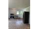 Awaiting updates, a kitchen features stainless appliances, ample light, and a functional layout at 286 Southside Rd, Rock Hill, SC 29730
