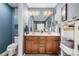 Bathroom with double sink vanity and ample lighting at 35 Dorie Dr, Belmont, NC 28012