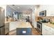 Well-equipped kitchen with stainless steel appliances, a breakfast bar, and granite countertops for meal preparation at 35 Dorie Dr, Belmont, NC 28012