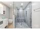 Modern primary bathroom with a frameless glass shower and updated vanity at 3807 Sweetgrass Ln, Charlotte, NC 28226