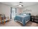 Comfortable bedroom showcasing a cozy rocking chair and a bright window view at 3807 Sweetgrass Ln, Charlotte, NC 28226