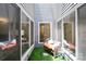 Outdoor lounge featuring privacy fence, pavers, lounge furniture and sliding glass doors at 3807 Sweetgrass Ln, Charlotte, NC 28226