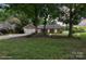 Charming single-story home featuring a well-maintained front yard and attached garage at 3807 Sweetgrass Ln, Charlotte, NC 28226